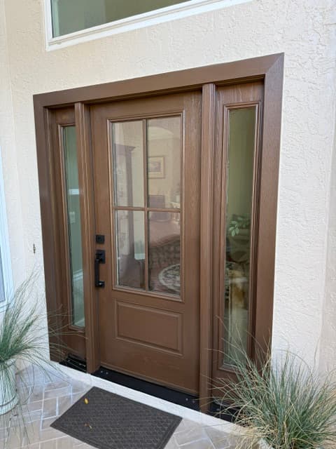 Custom walnut stained entry door in Sarasota, FL